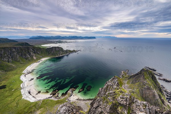 View from Matinden Mountain to sandy beach and rocky coast