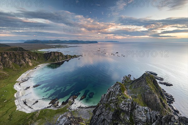 View from Matinden Mountain to sandy beach and rocky coast