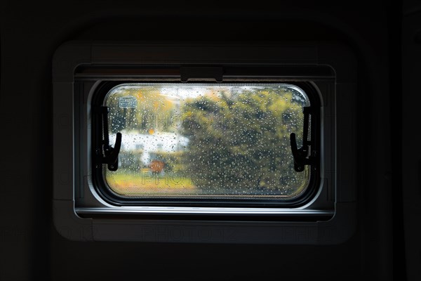 View out of a blessed window of Campervan