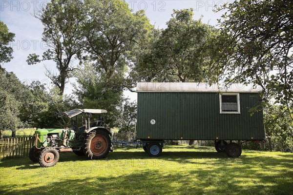 Tractor and removed construction trailer