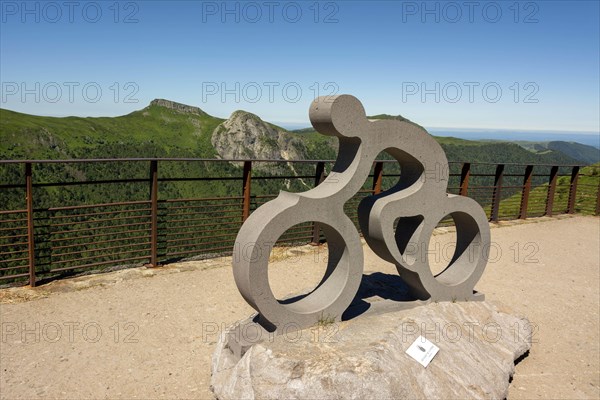 Statue le Velo of Emmanuel Hebrard at the top of Pas de Peyrol in the Auvergne volcanoes regional natural park