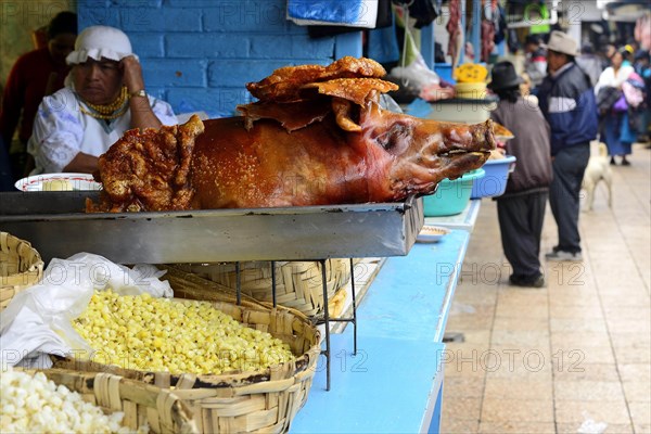 Whole sucking pig at a market stall