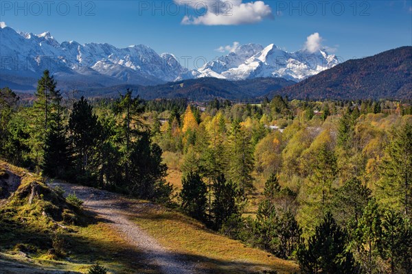 Autumn landscape in the Isar valley with Alpspitze and Zugspitze in the Wetterstein range