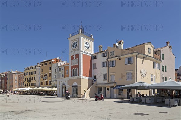 Old town with Venetian clock tower and fountain