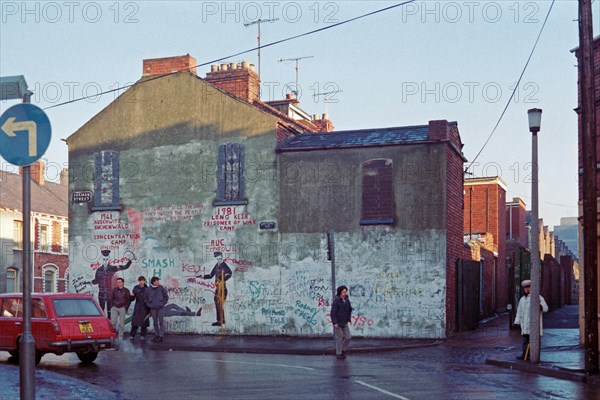 Street scene and graffiti on a house front