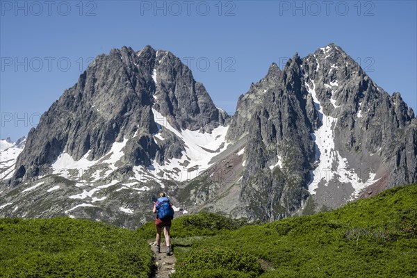 Hiker on trail to Aiguillette des Posettes