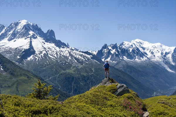 Hiker standing on rocks