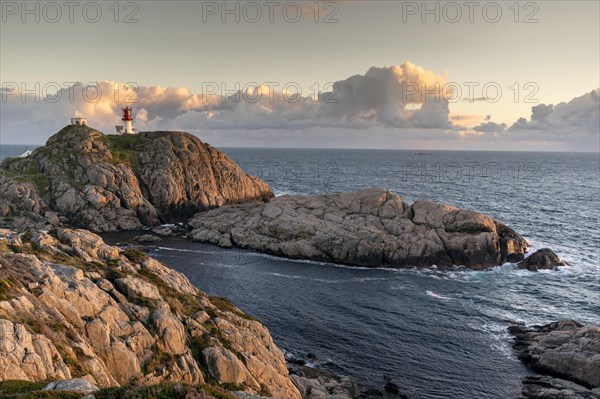 Lindesnes lighthouse at rocky coast