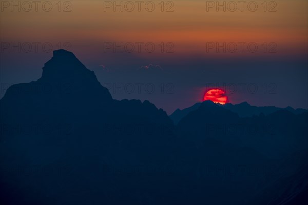 Dramatic sunset with summit of the Hochvogel