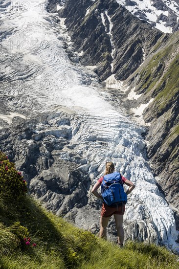 Hiker in front of glacier