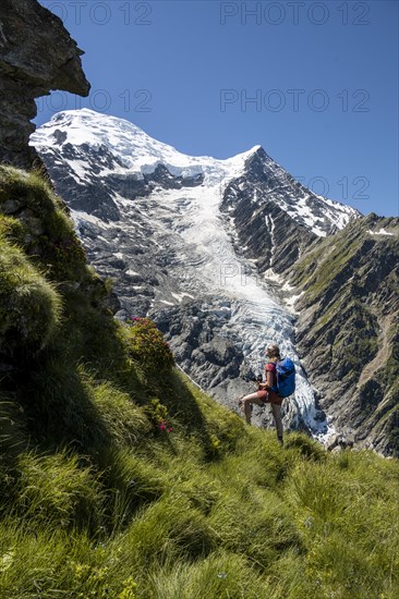 Hiker in front of glacier