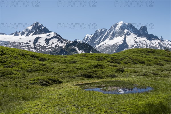 Small mountain lake at Aiguillette de Poisettes