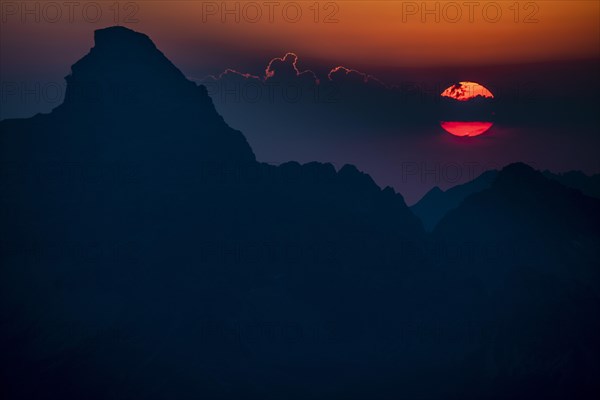 Dramatic sunset with summit of the Hochvogel