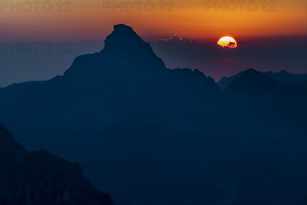 Dramatic sunset with summit of the Hochvogel