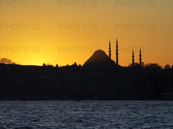 Silhouette of a mosque on the Bosporus at sunset