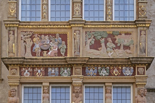 Painted reliefs on the facade of the Tempelhaus