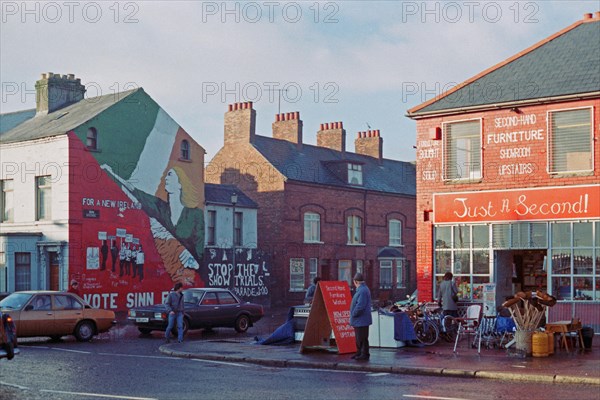 Street scene with car traffic and shops