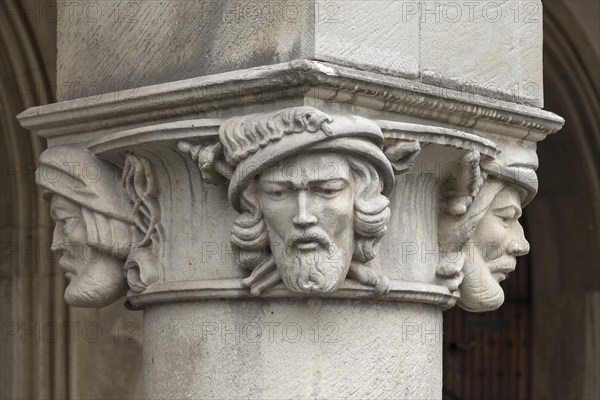 Column capitals with sculptures of the Anabaptist leaders