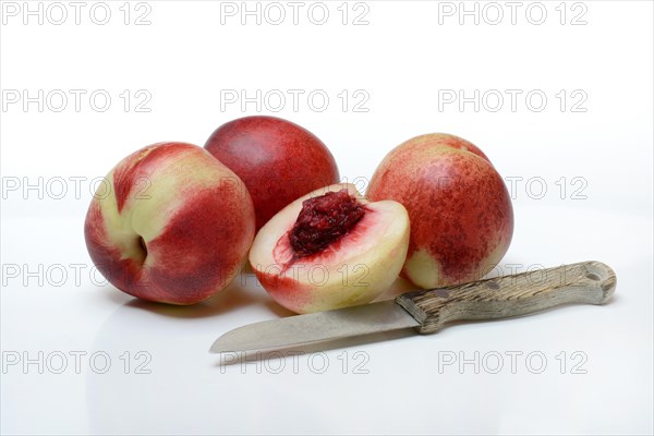 Halved nectarine and nectarines