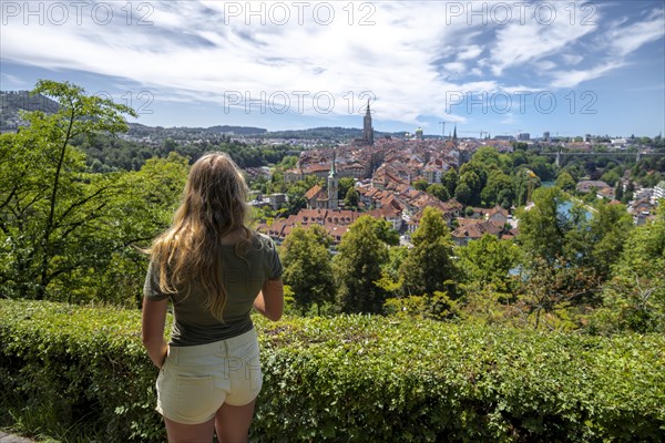 Young woman looking over the city