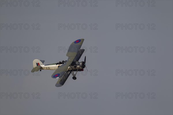 Fairey Swordfish aircraft in flight in Royal Navy markings