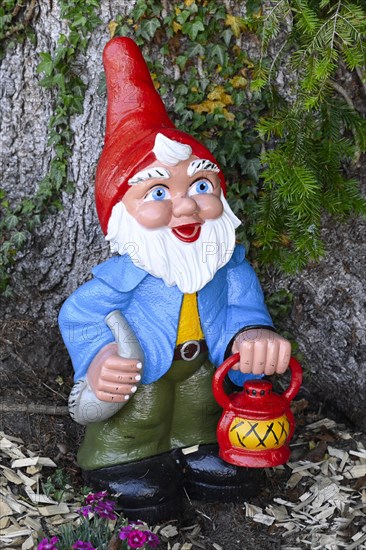 Garden gnome with lantern