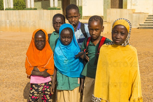 Local school children look at the camera