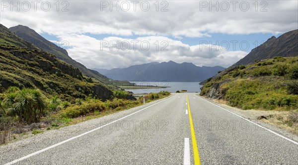 Road with views of mountains and Lake Hawea