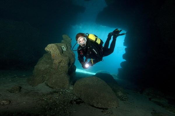 Diver in cave entrance