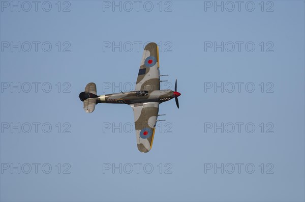 Hawker Hurricane aircraft in flight in Royal air force markings