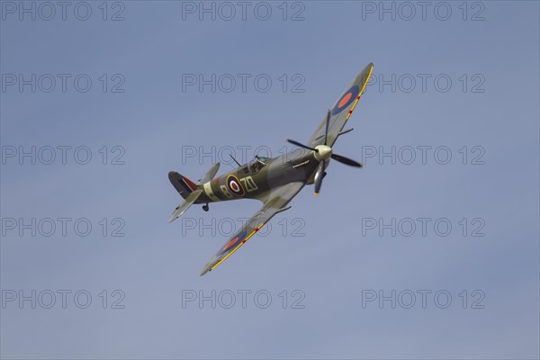 Supermarine Spitfire aircraft in flight in Royal air force markings