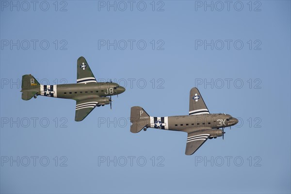 Douglas C-47 Dakota two aircraft in flight in United States Airforce markings