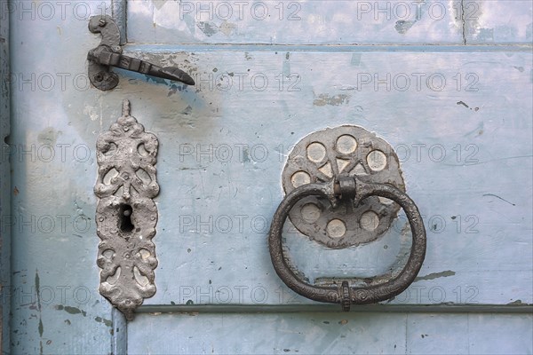 Old door fittings and door knockers at the entrance door of the Trinity Church