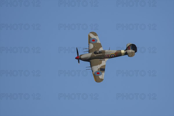 Hawker Hurricane aircraft in flight in Royal air force markings