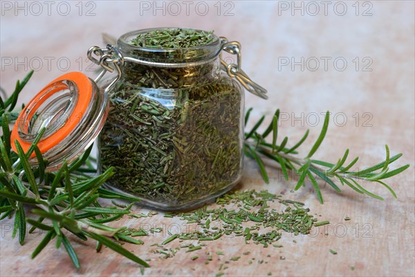 Dried rosemary in glass jar