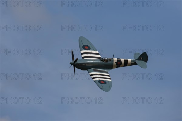 Supermarine Spitfire aircraft in flight in Royal air force markings