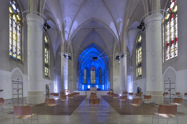 Colorfully illuminated altar room in the church of St. Martini