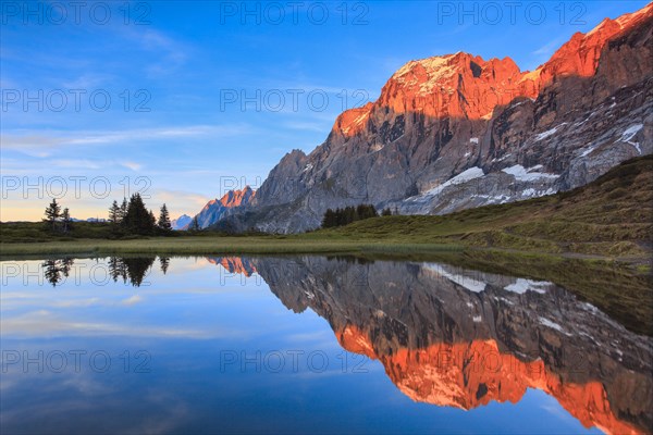 Wellhorn and Engelhoerner with mountain lake