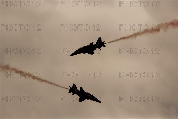 BAE Systems Hawk two aircraft of the Royal Air Force Red Arrows display team in flight