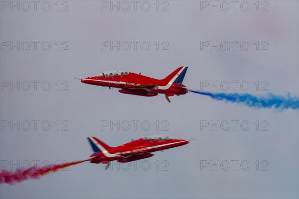 BAE Systems Hawk two aircraft of the Royal Air Force Red Arrows display team in flight