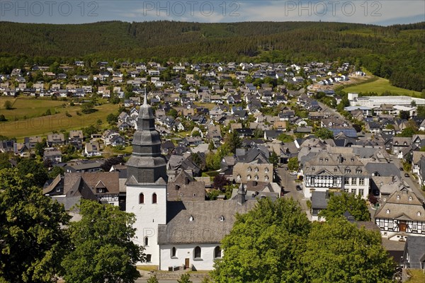 Saint John the Evangelist Church with village view