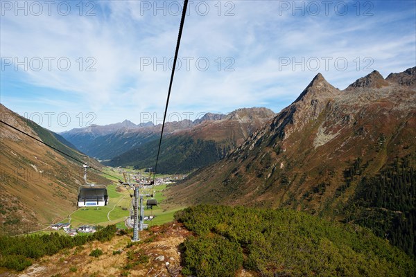 Cable car Birkhahnbahn with Gorfenspitze and view of Galtuer