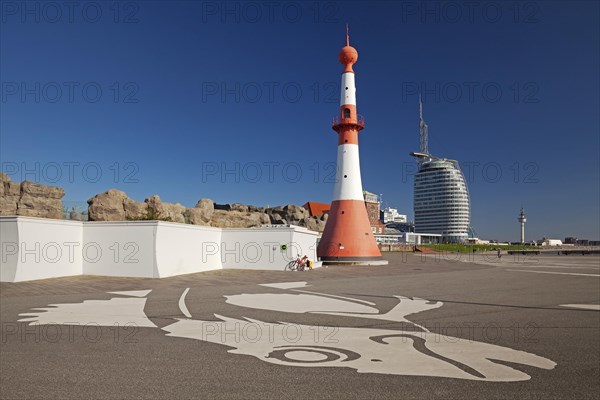 Willy-Brandt-Platz with lighthouse front light and Atlantic Hotel Sail City