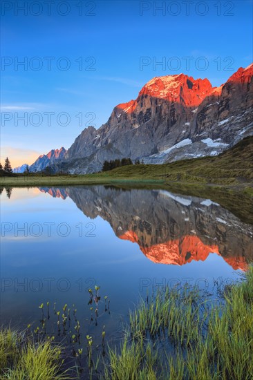 Wellhorn and Engelhoerner with mountain lake