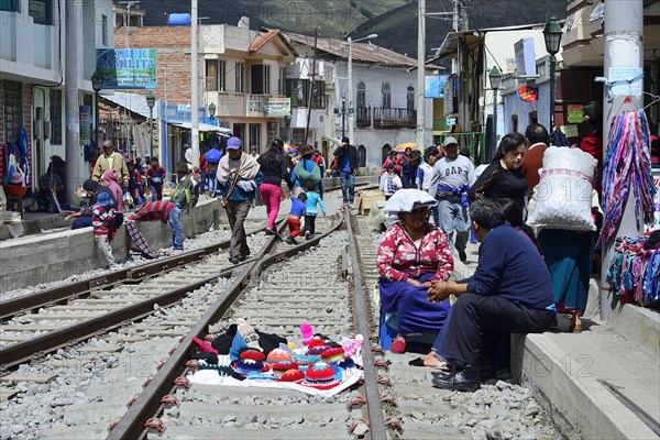 Weekly market with stalls on the railway tracks