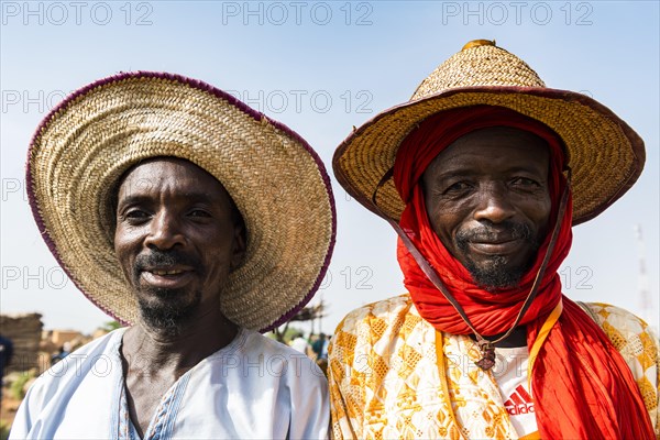 Portrait of two friendly Peul men