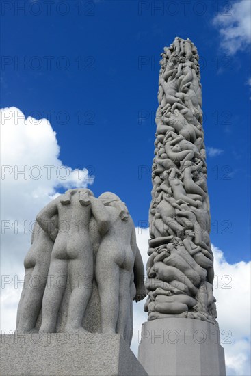 Monolith and human figures