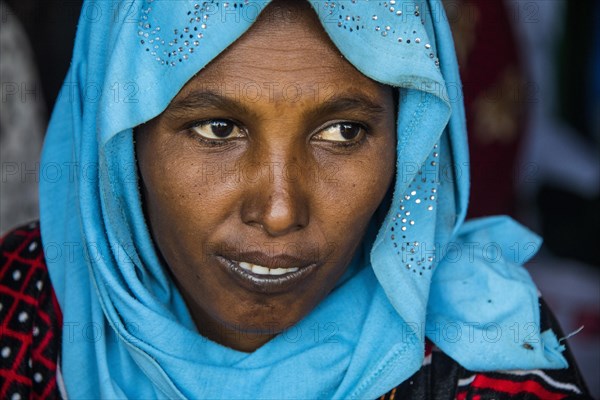 Colourful dressed toubou woman