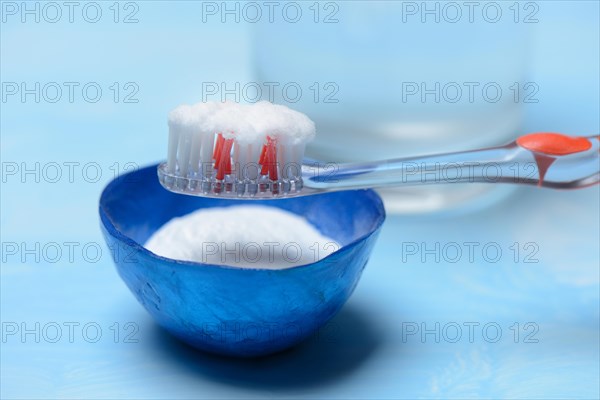 Sodium powder on toothbrush