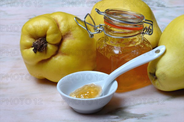 Quince jelly in spoon